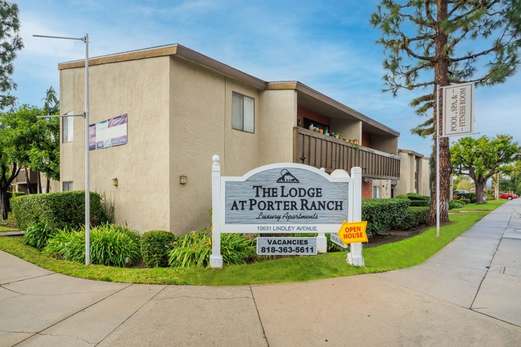 Leasing sign and partial view of building